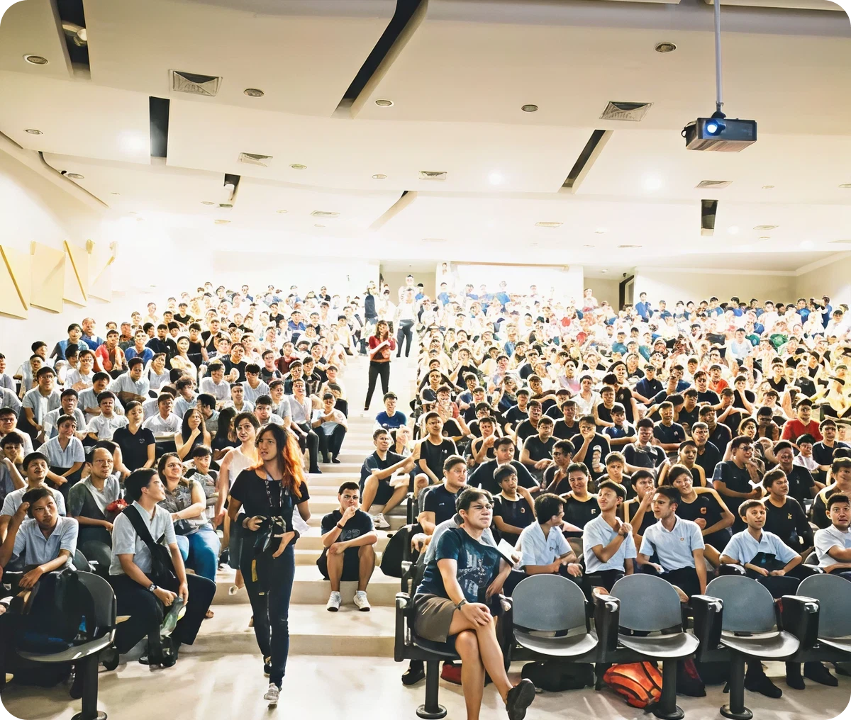 Packed auditorium with seated audience